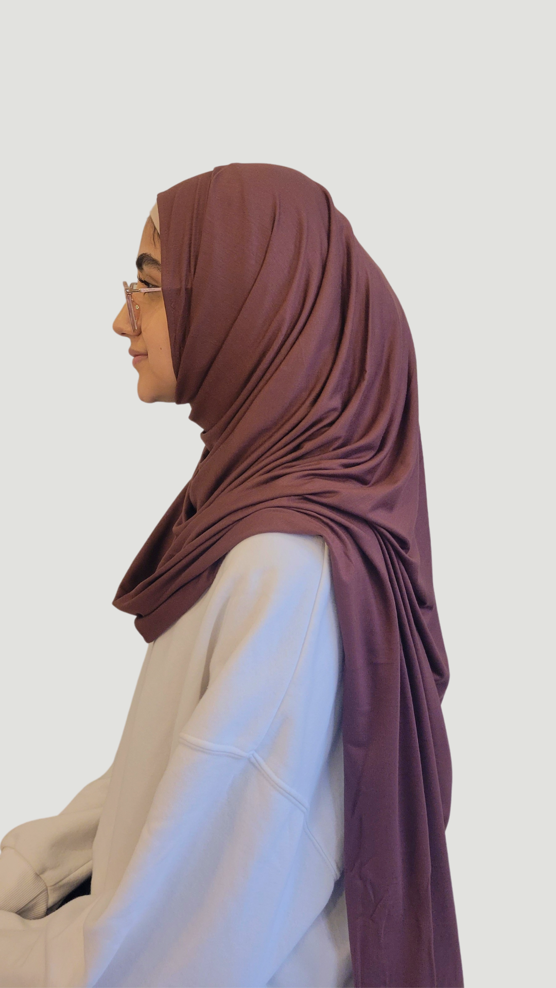 An instant jersey hijab designed for easy styling, without the need for pins. This pinless hijab is made from comfortable jersey fabric, offering a soft and stretchy texture.