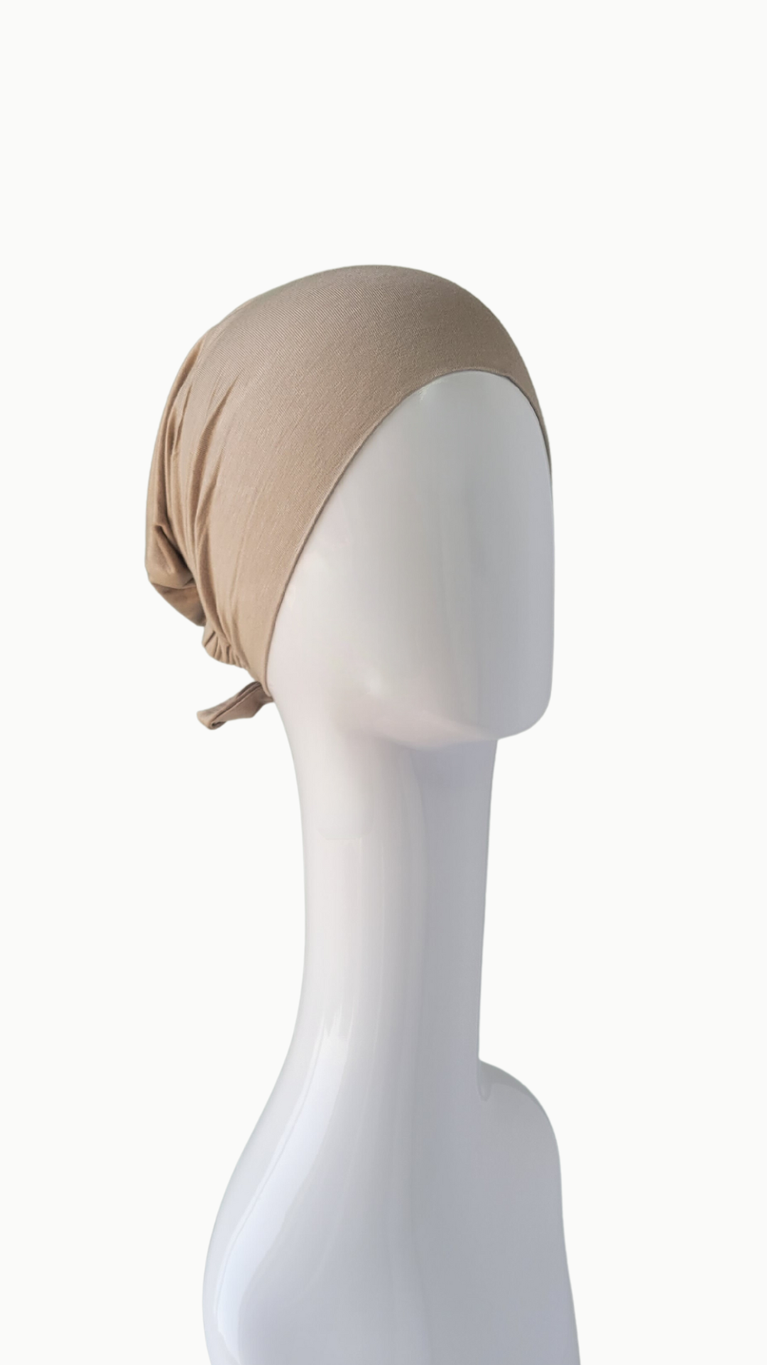 A comfortable and versatile basic tie-back undercap suitable for everyday wear. This undercap features a simple design with adjustable ties at the back, allowing for a customizable fit. 