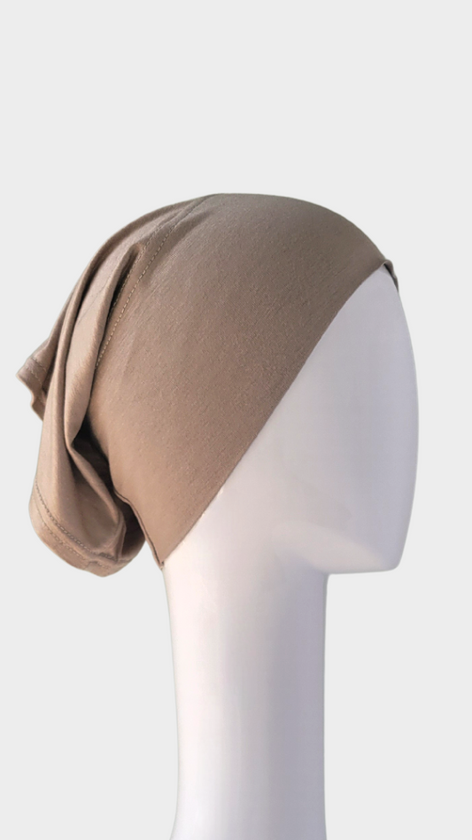 A practical basic tube undercap designed for everyday wear. This undercap features a tube-like shape, providing a snug yet comfortable fit over the head. 