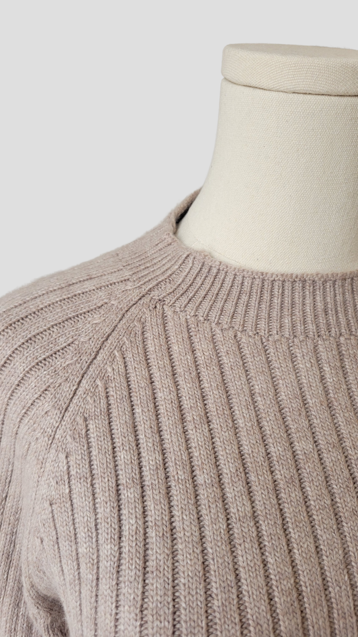 A chic two-piece knit co-ord set in 'Wheat', a beige colour. The set includes a comfy sweater with a relaxed fit and matching knit pants. Perfect for a stylish and cozy look.